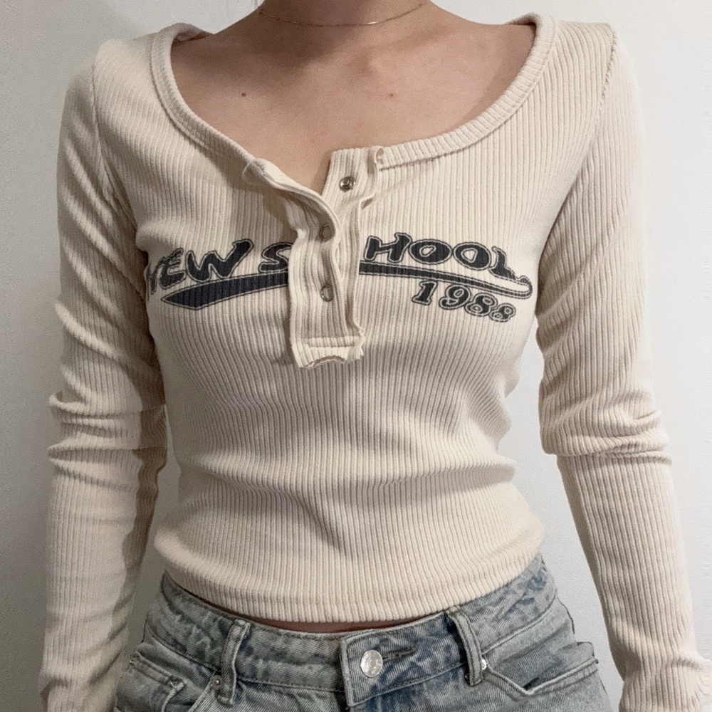 beige long sleeve shirt